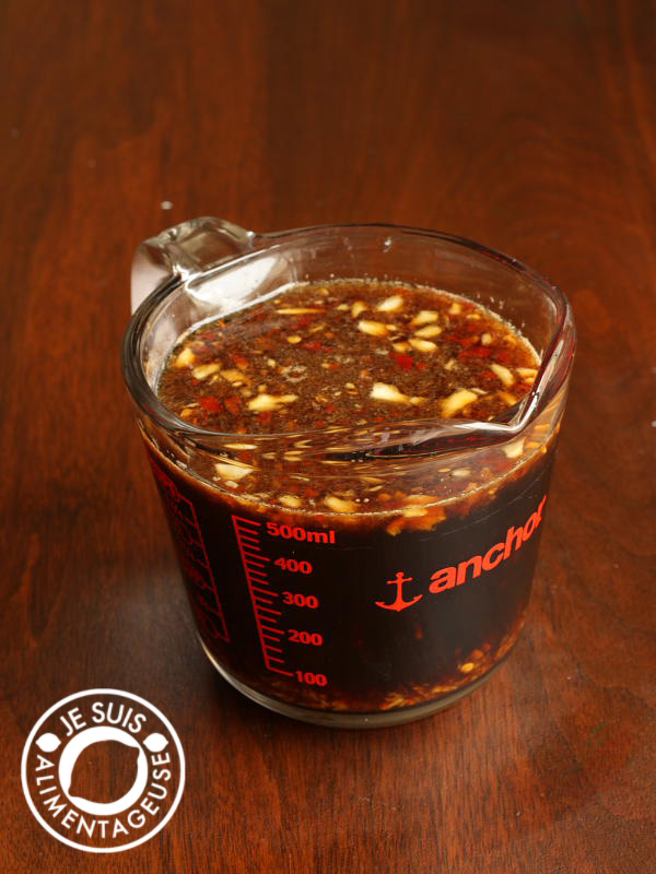 Nước chấm chay - soy sauce version of dipping sauce in a measuring yup