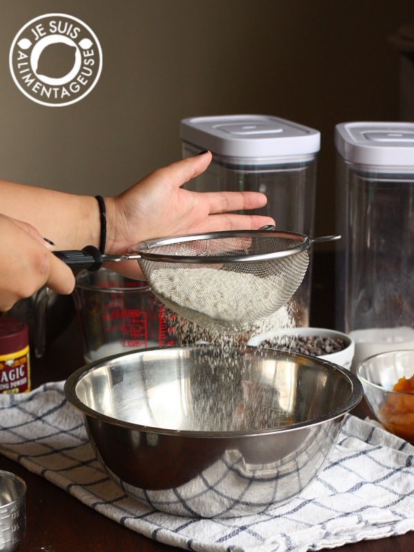 Sifting flour for Pumpkin Chocolate Chip Muffins | alimentageuse.com #pumpkin #fall #chocolate #vegan