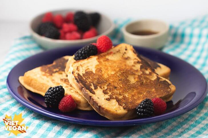 vegan french toast on a plate with berries