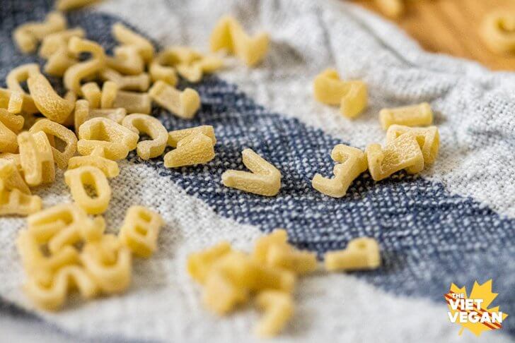 alphabet noodles on a tea towel