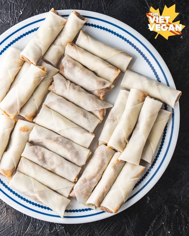 Freshly wrapped lumpia shanghai on a plate from above