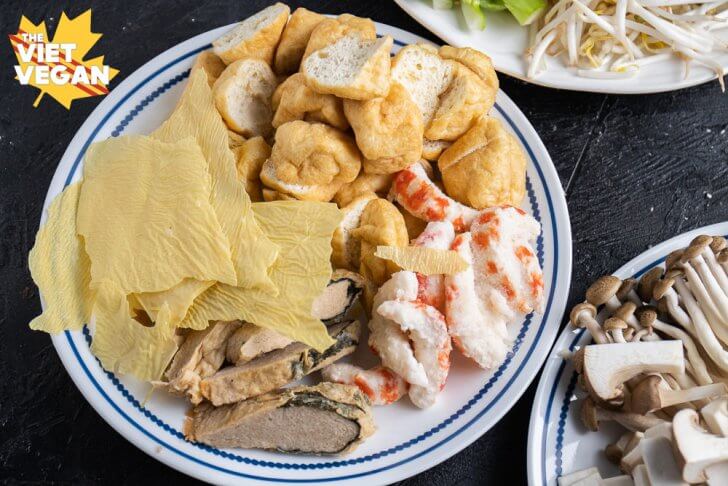 tofu puffs, vegan shrimp, vegan fish strips and dried bean curd on a plate