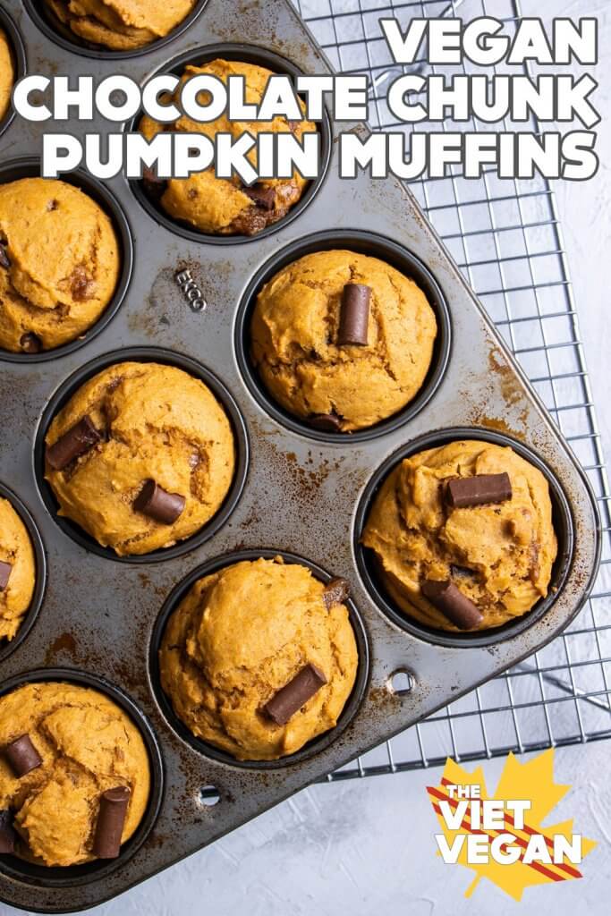 baked muffins in a baking pan on a cooling rack, on a white surface