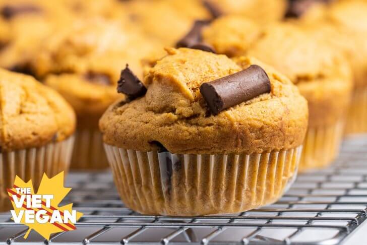 chocolate chunk muffins on a cooling rack, close up