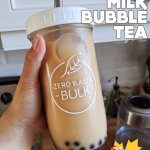 bubble tea in a tall 16oz jar with a white lid and metal straw