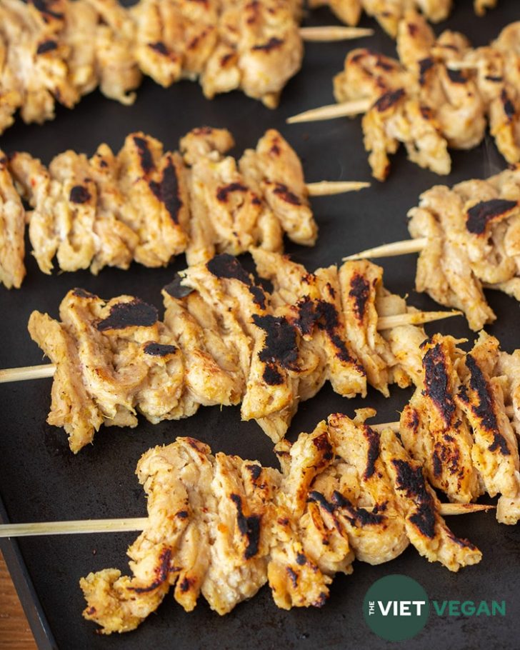 skewered marinated soy curl satay on the griddle, caramelized