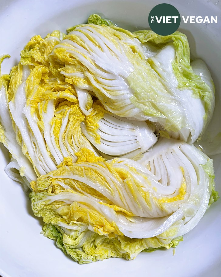 napa cabbage in a bowl, wilted after being brined for 2 hours
