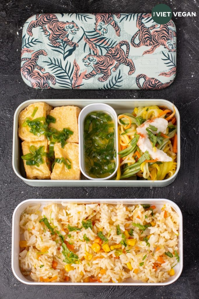 Fried tofu with green onion sauce, green mango salad, and fried rice