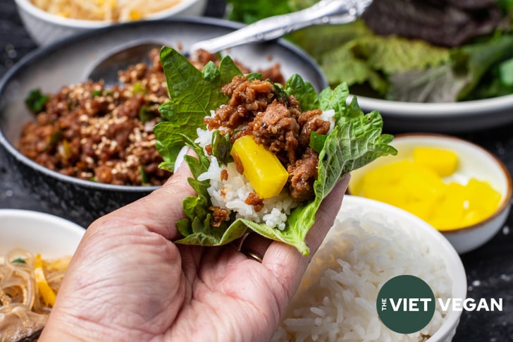 vegan bulgogi with rice, and pickled radish in a shiso leaf