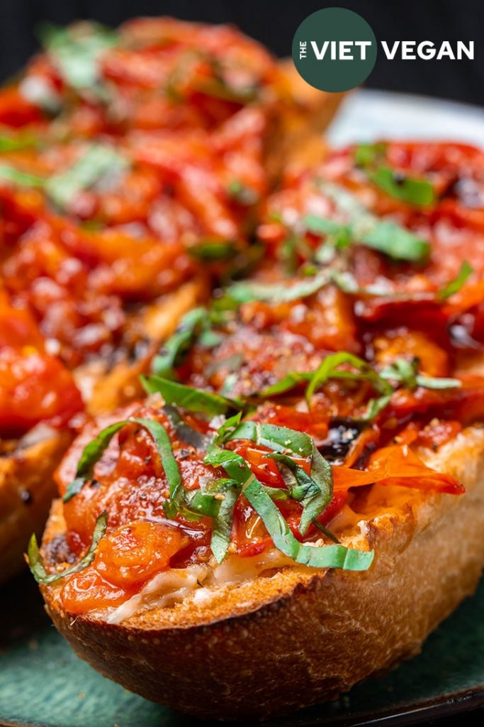 close up of tomato garlic confit toast