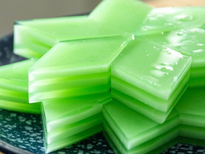 side view of coconut pandan jellies on a plate