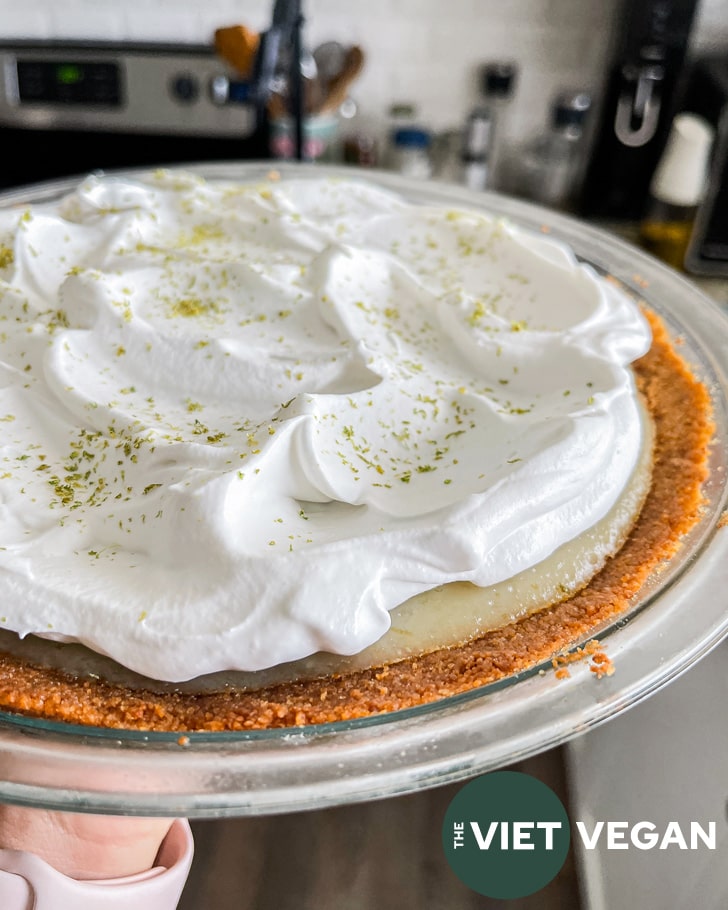 vegan key lime pie with whipped cream on top
