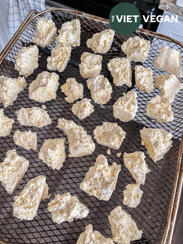 tofu on a rack before airfrying