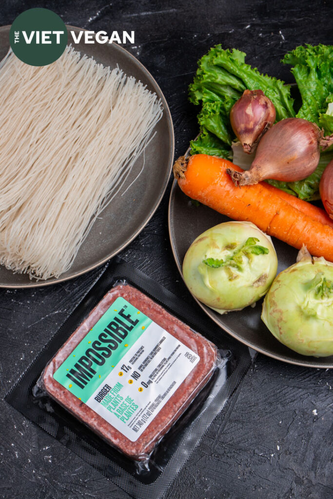 Ingredients for bún chả chay arranged on a dark background
