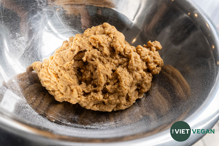 Seitan dough resting in a mixing bowl